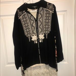 Embroidered shirt with florals pattern on back
